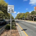 Speed limit sign of twenty five miles per hour.